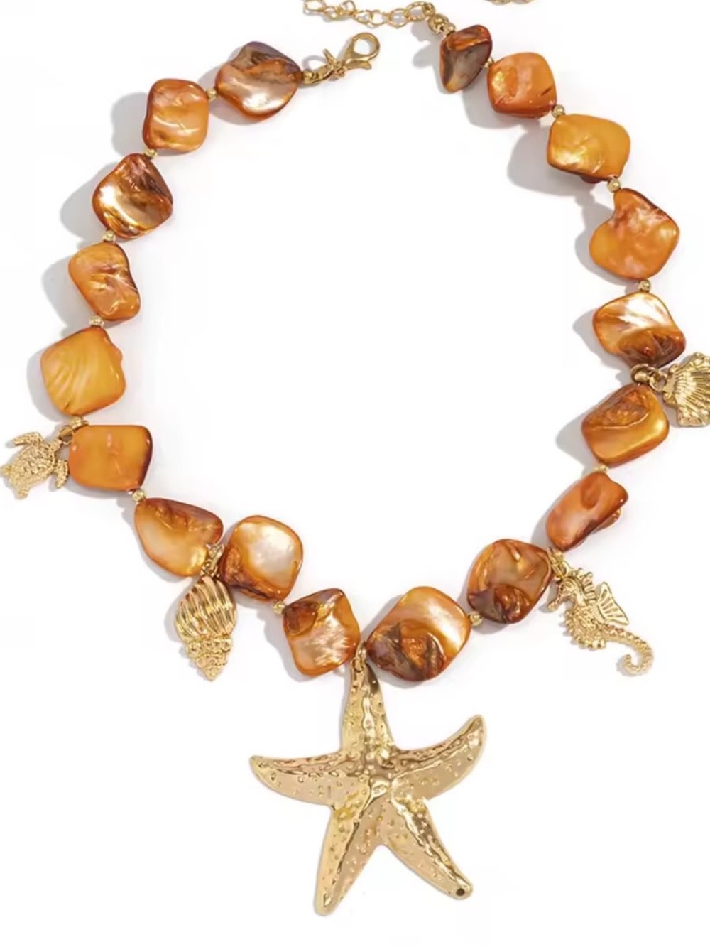 Anthropologie Gold Tone and Pearlescent Shell Starfish Charm Necklace